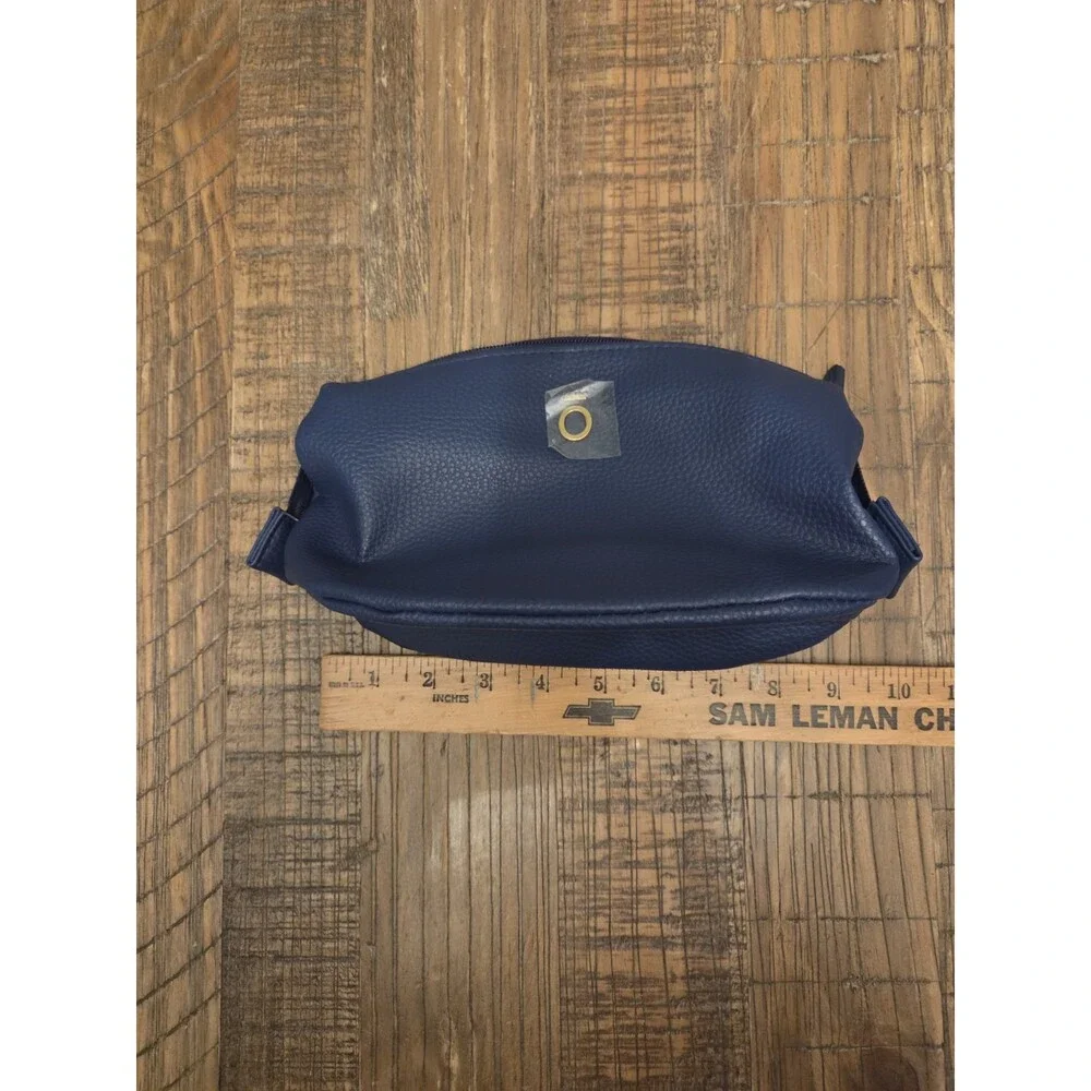 doTERRA Yarrow Pom pouch has a pebble-grain texture and durable construction